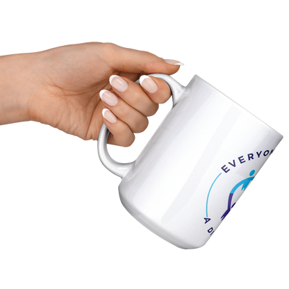 15oz_White_Mug_15ozWhiteMugLifestyleLHRaisedAngle_Mockup.png_15952280