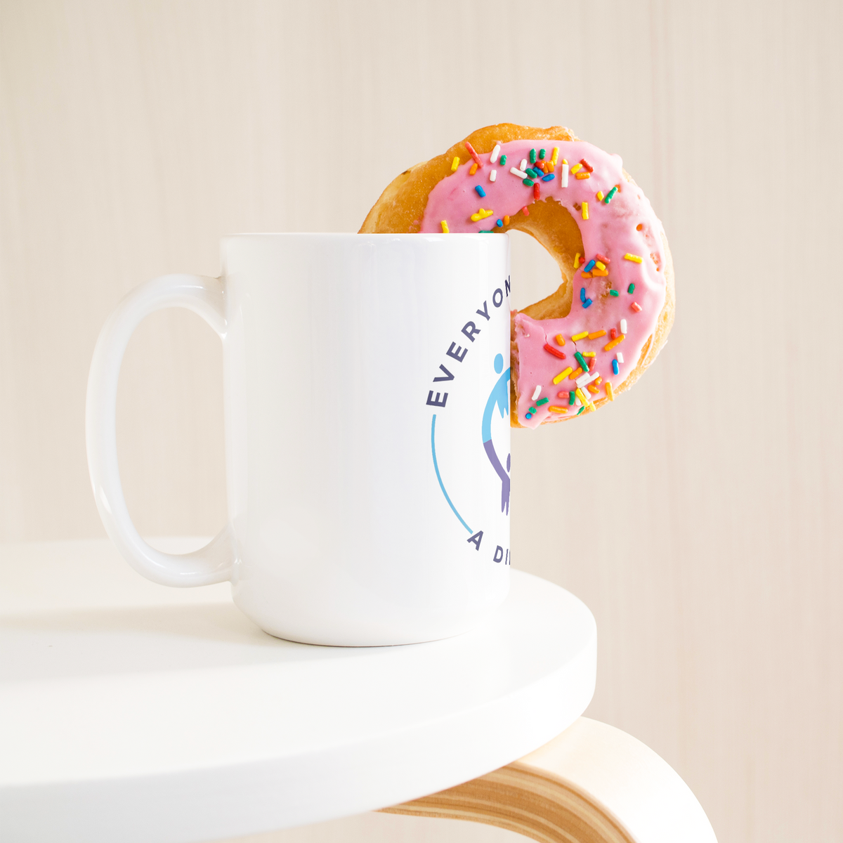 15oz_White_Mug_15ozWhiteMugLifetsyleDonutLH_Mockup.png_15952278